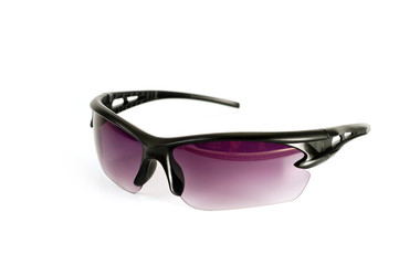 Sports and safety glasses made of black plastic with dark glasses, shot on a white background. Background for cycling. Background for work safety.