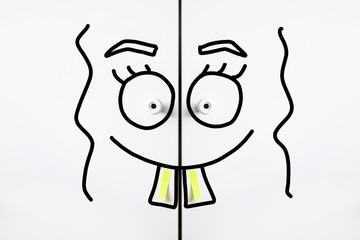 blank sticker for notes white drawers knobs cropped smile marker eyes kind female two front teeth