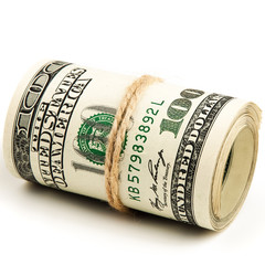 Roll of US dollars on a white background, isolated.