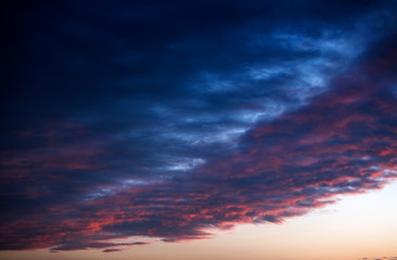 Fototapeta na wymiar Abstract nature background. Colorful dramatic sky with cloud at sunset.