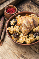 Stewed chicken thighs and porridge