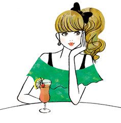 飲食店で人を待つ女性