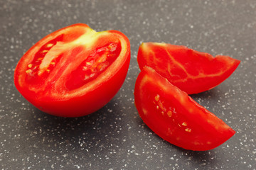 Chopped fresh tomato on a cutting board close up