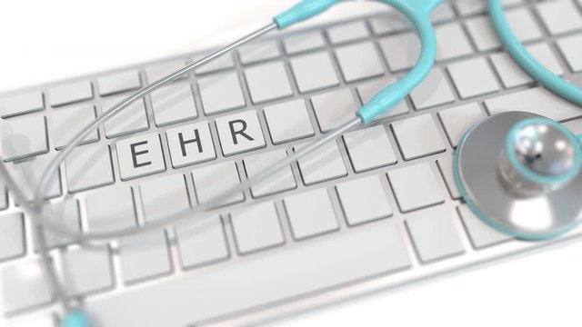 Stethoscope on keyboard with electronic health record EHR text. Modern medical technologies related conceptual 3D animation