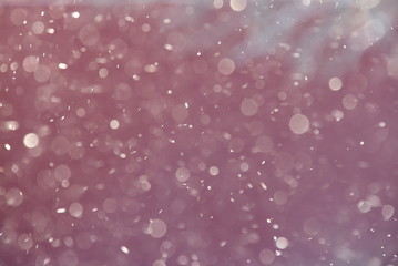 Burgundy background with circles of different diameters and shades