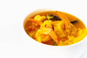 keang som goong, southern thai spicy soup with shrimp and mixed vegetables, famous local gourmet on white background