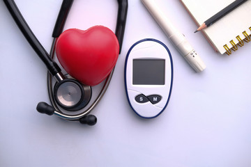 pills, diabetic measurement and stethoscope, top view 