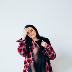 Young adult woman posing. Casual outfit.