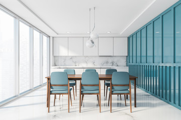 White and blue kitchen interior, counter and table