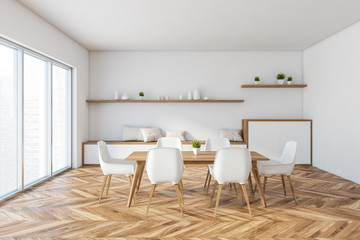 White panoramic dining room with cabinet