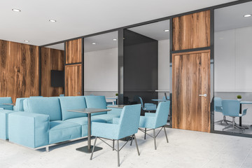 Naklejka na ściany i meble Office lounge corner with blue sofas