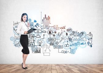 Woman with clipboard and her business plan