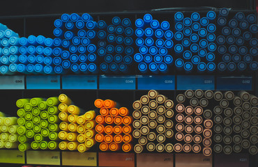 shelf with multicolored markers in the store