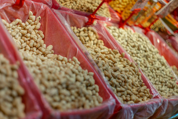 Boxes of peanuts at a stall of a night market in Singapore
