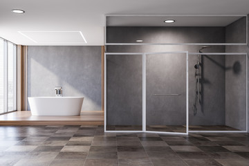 Gray bathroom with tub and shower