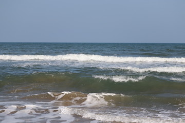 Soft wave of blue ocean on sandy beach.Summer beach and sea, marina beach