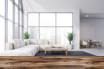 Table in white living room and dining room