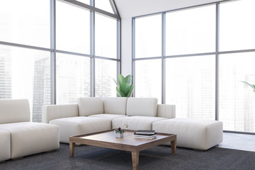Panoramic white living room corner with sofa