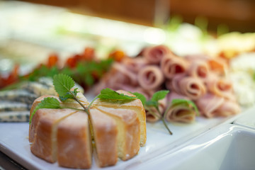 Restaurant breakfast menu with various cakes.
