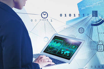 Engineer using big data interface in city