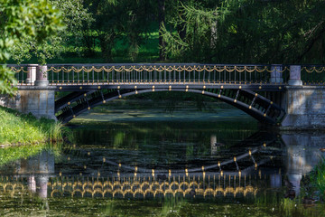 PUSHKIN / RUSSIA - AUGUST 2015: Decorated bridge in the park, Pushkin (Tsarskoe Selo), Russia