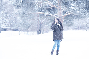 Beautiful girl in a beautiful winter snow