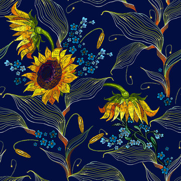 Embroidery yellow sunflowers and blue meadow herbs seamless pattern. Summer floral art. Fashion colorful template for clothes, tapestry, t-shirt design