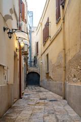 View of a narrow street in the Italian city Bari.