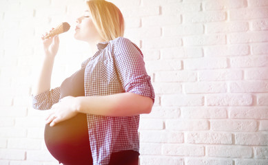 Pregnant young beautiful girl on the ninth month