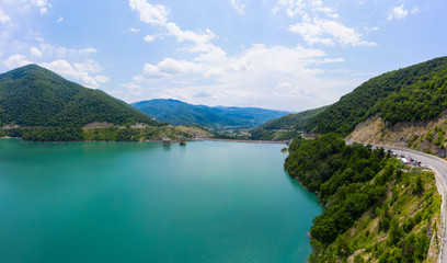 Fototapeta na wymiar mountains and lake, dam in the mountains. Zhinvali water reservoir. Zhinvali dam.