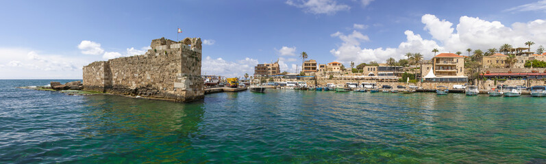 Fototapeta na wymiar Byblos, Lebanon - one of the oldest continuously inhabited cities in the world, and UNESCO World Heritage Site, the Old Town of Byblos displays a wonderful harbour, once used by Romans and Phoenicians
