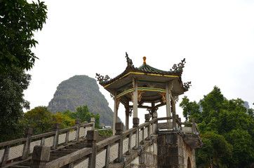 Naklejka premium Stairs and a Traditional Construction in one of the Hills of Yangshuo, Guangxi