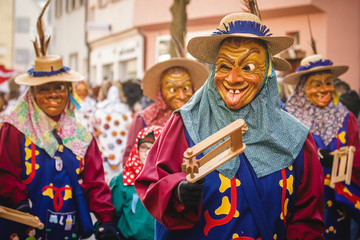 Festival participants dressed up in handmade costume and mask at the Ulmzug carnival event in Ulm,...