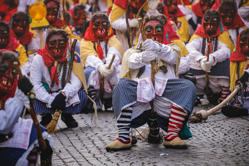 Festival participants dressed up in handmade costume and mask at the Ulmzug carnival event in Ulm,...