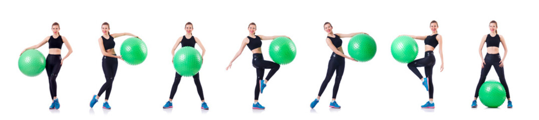 Young woman with ball exercising on white