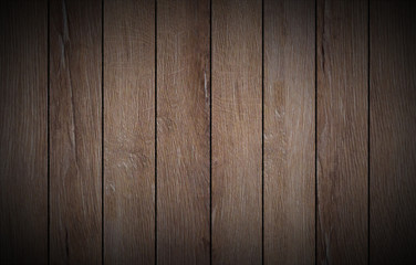 Old grunge dark textured wooden background, top view brown paneling. Vintage
