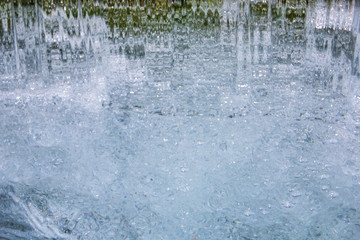 Fototapeta na wymiar crystal clear water background, clear water cascade