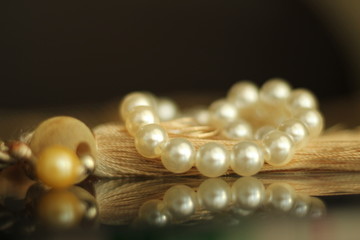 pearl necklace on black background