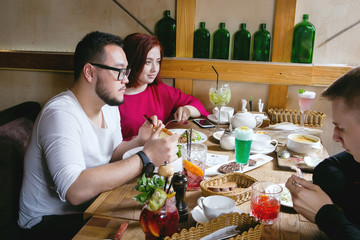 Man and a woman in a restaurant.