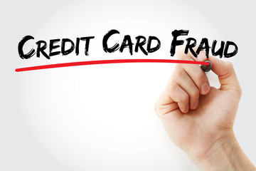 Credit card fraud text with marker, business concept background
