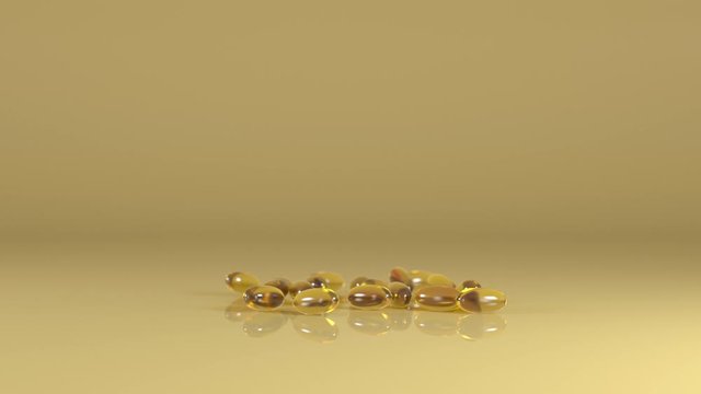 Vitamin pills fall on the ground, area above pills for adding text. Slow Motion