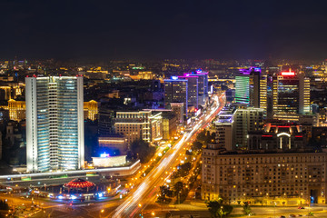 Naklejka na ściany i meble Moscow. Russia. Night Moscow with a quadcopter. Cars in the night city. Russia night. Moscow roads. Highlighting buildings in the capital. Trip to the Russian Federation. Cities of Russia.