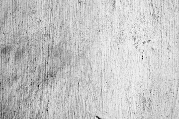 Texture of a concrete wall with cracks and scratches which can be used as a background