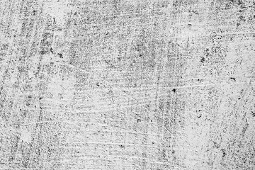 Texture of a concrete wall with cracks and scratches which can be used as a background