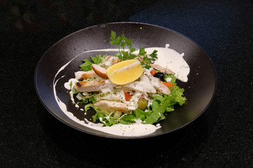 Food on a black background. Restaurant food.