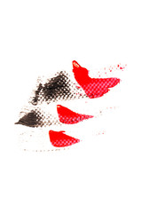 Red cosmetics for a woman. A sample on a white background.