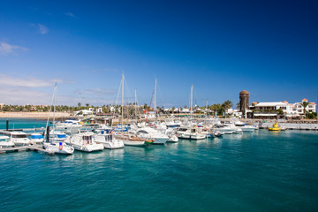 Marina with lighthouse,  Caleta de Fuste, Fuerteventura, Canary Islands, Spain, Europe