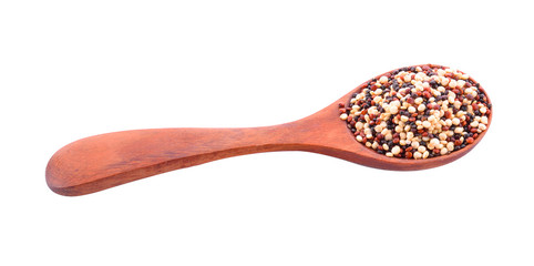 Quinoa in a wooden spoon isolated on a white background