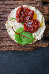 sun-dried tomatoes, sandwich appetizer snack (bruschetta) menu concept. background. top view. copy space