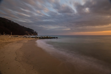 Amazing sunrise over wooden pier in Gdynia Orlowo.
